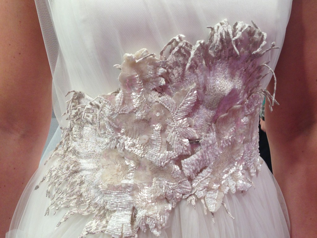 The elaborate beaded applique added to the unique drama of Kelsey’s gown.
